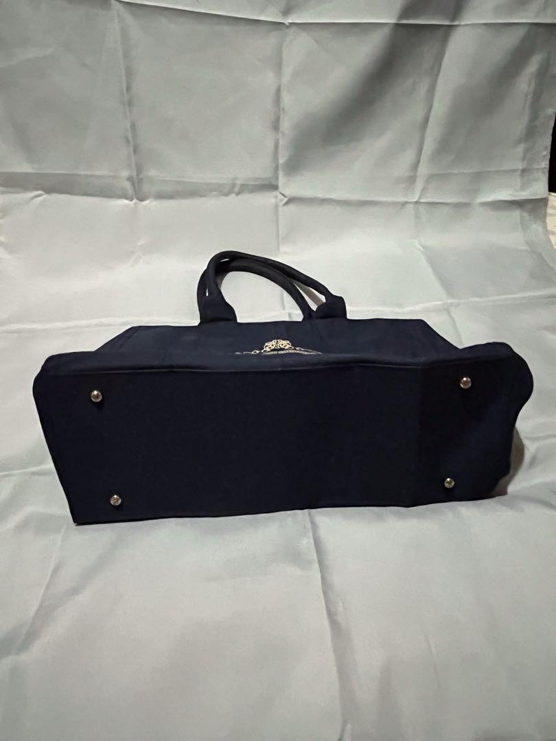 Laisse Passe Canvass Shoulder Bag (Category: Tote Bags) located in Valenzuela. Submitted by hey_sera (Listing ID 1178758303, Image 3). Description: Laisse Passe Canvass Shoulder Bag Lots of compartment Durable / Washable Still in good condition .