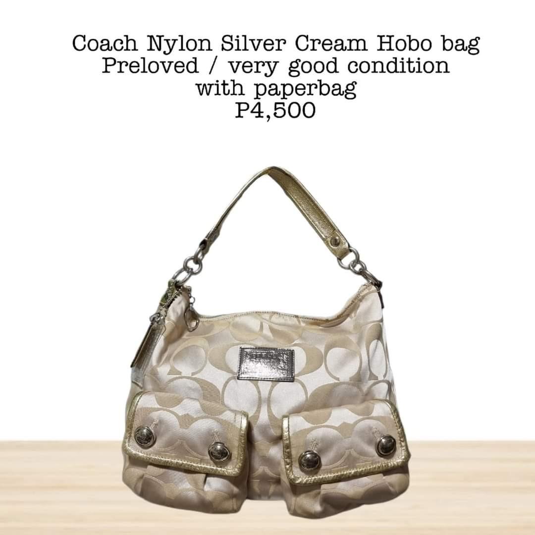 Coach Nylon Silver Cream Hobo Bag (Category: Luxury Bags & Wallets) located in Caloocan City. Submitted by lujosacollection (Listing ID 1178774546, Image 1). Description: 100%Authentic/Original Preloved Coach Nylon Silver Cream Hobo Bag In very good condition Comes with paperbag.