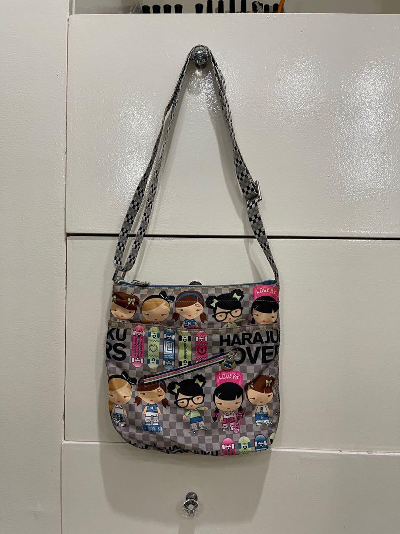 Harajuku Lovers Bag (Category: Cross-body Bags) located in Apalit. Submitted by byebyeclutterph (Listing ID 1178775405, Image 1). Description: Authentic HL bag, well-used. .