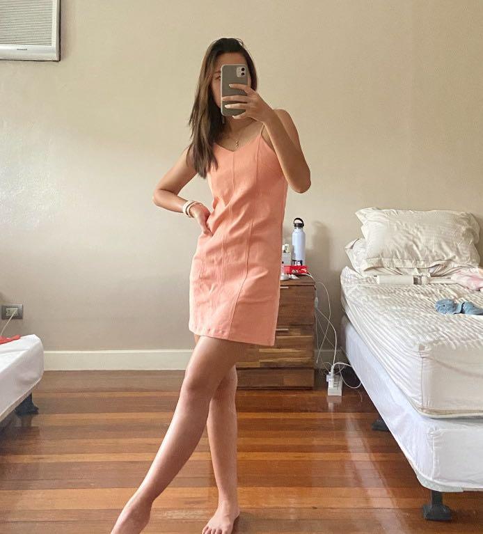 [REPRICED] Pink Dress (Category: Dresses) located in Pasig City. Submitted by declutter.jr (Listing ID 1137123012, Image 2). Description: Libe Workshop - local Vietnam brand Soft denim-like material Adjustable straps Front pocket on both sides Fits XS-S Barely used.
