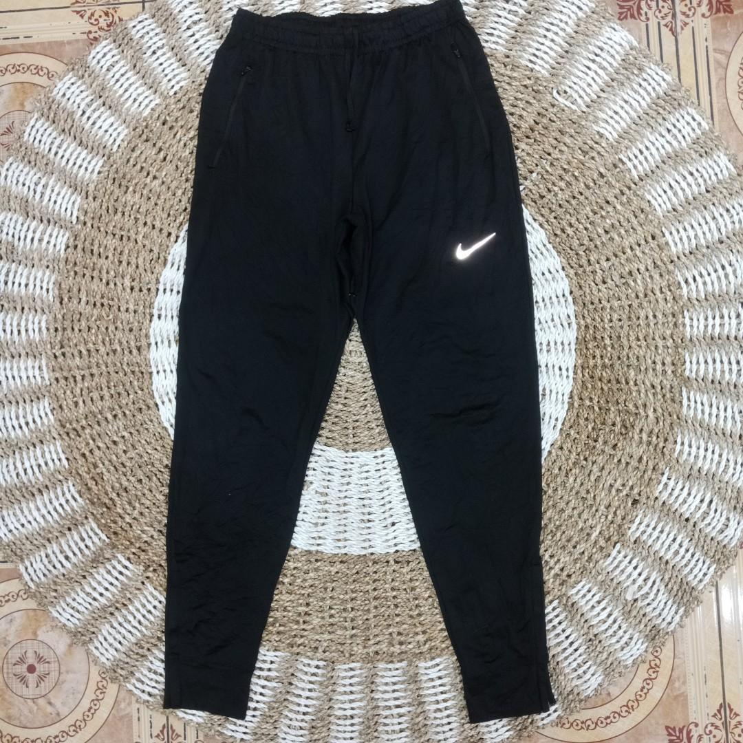 Nike drifit reflective jogger pants, Olah Raga, Baju Olahraga di Carousell