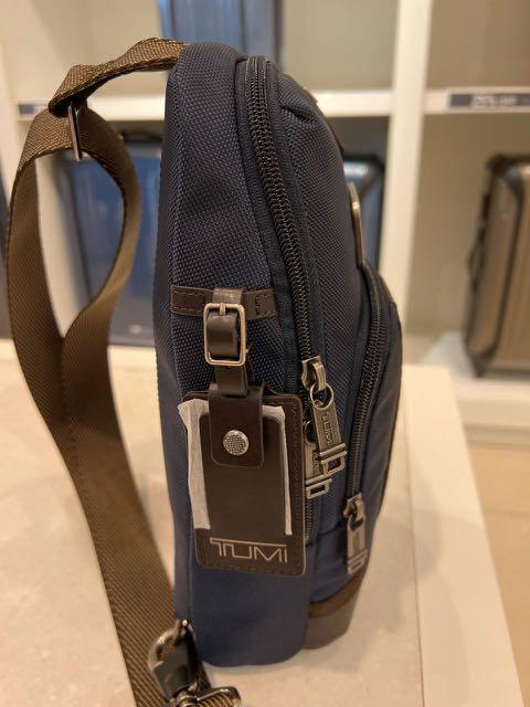 Tumi sling deals bag price