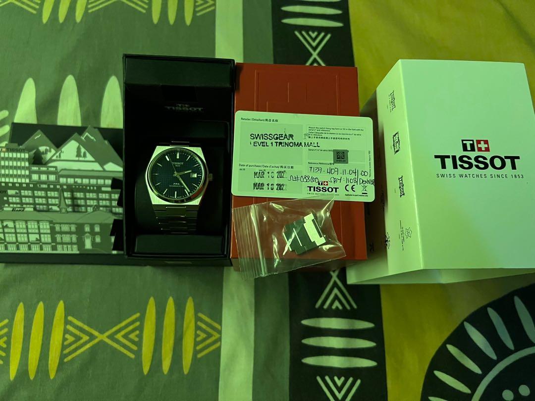 Tissot trinoma top