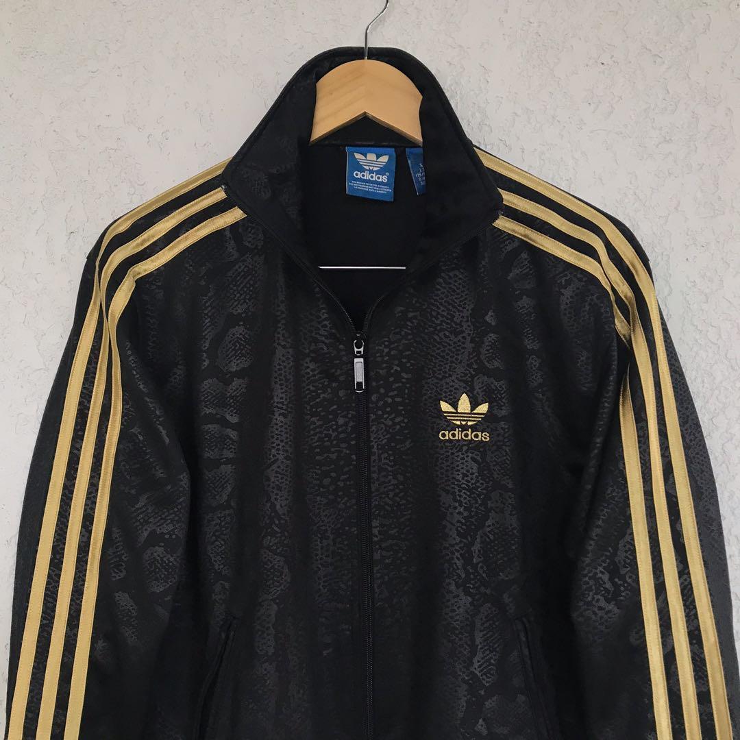Adidas track jacket gold deals stripe