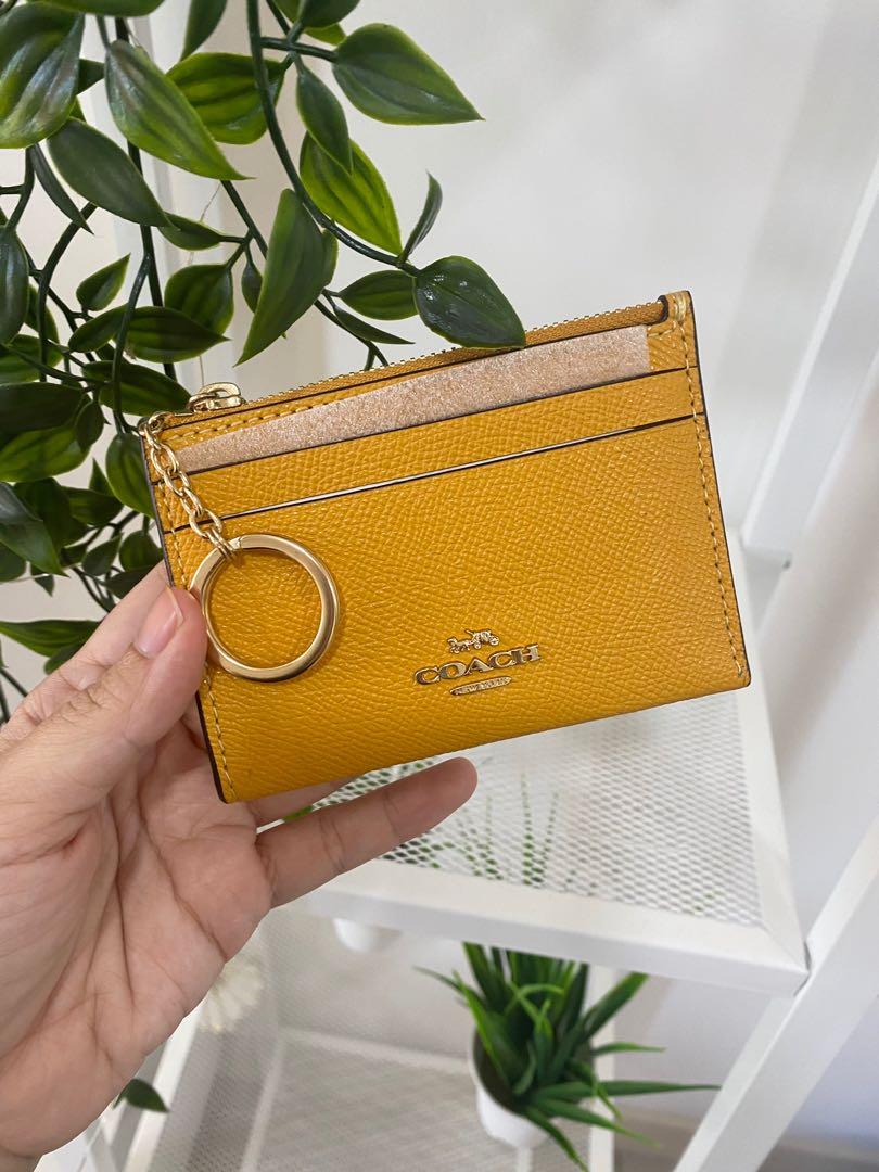 Mustard yellow coach wallet shop