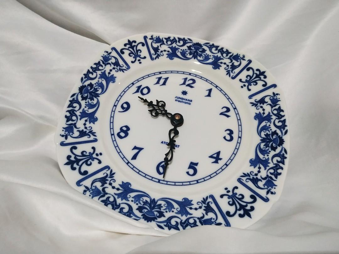 JUNGHANS Porcelain Clock (Category: Clocks) located in Pasig City. Submitted by don200 (Listing ID 1178993905, Image 2). Description: This Gorgeous 9 inch Clock is hand painted on porcelain decorated with blue on white background and has a large numbers with magnificent detailed arms. This Clock is from Germany and is Battery operated.