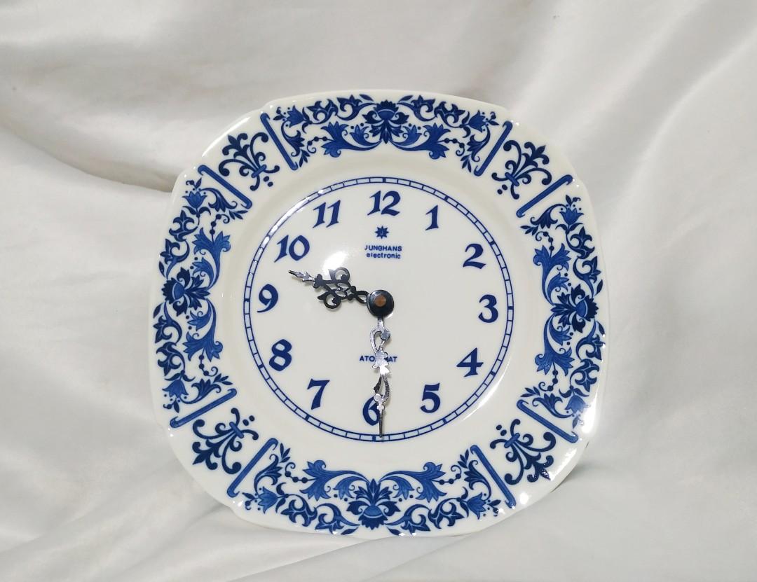 JUNGHANS Porcelain Clock (Category: Clocks) located in Pasig City. Submitted by don200 (Listing ID 1178993905, Image 1). Description: This Gorgeous 9 inch Clock is hand painted on porcelain decorated with blue on white background and has a large numbers with magnificent detailed arms. This Clock is from Germany and is Battery operated.