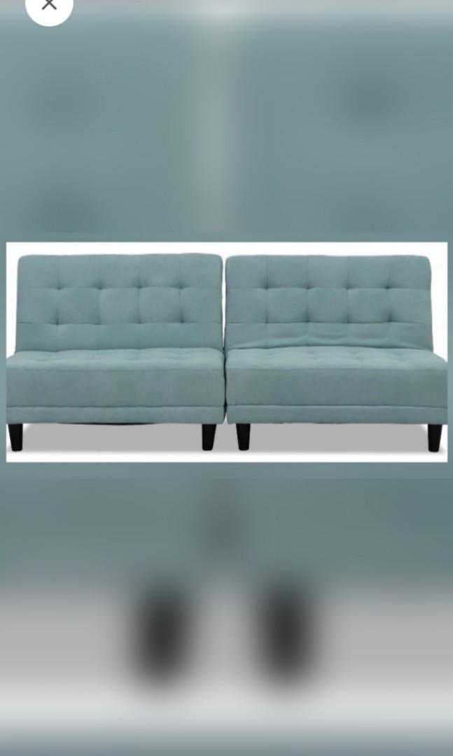 Sofa bed (Category: Sofas) located in Singapore. Submitted by carrotti777 (Listing ID 1178422934, Image 3). Description: fabric. turquoise. can sit, lean or lie down 3 ways. some gentle stains but we always use sofa cover 2-3 layers. no broken. fabric still good. between like new to well used. self collect at 610119 can fit in van. pls collect by today or tmr Monday 22 Aug latest..