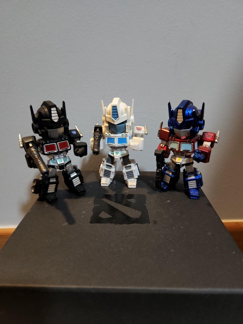 Transformers (Category: Vintage Collectibles) located in Singapore. Submitted by capsnhoods (Listing ID 1178996458, Image 1). Description: $120 for whole set Optimus Prime- $20 Optimus Prime Black edition- Sold Ultra Magnus-Sold Megatron-$20 Grimlock-$20 ThunderCracker-$10 Jazz-$10 Bumblebee-$10 WheelJack-$10 Sound Blaster-$10 SoundWave-$10 SmokeScreen-$10.