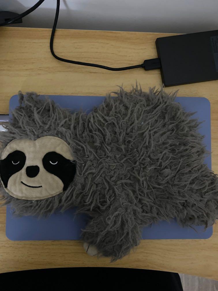 Typo shop sloth cushion