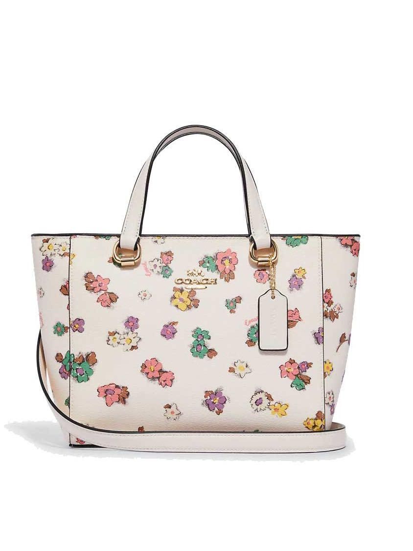 White coach deals bag with flowers