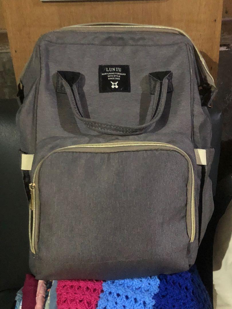 Diaper Backpack (Category: Diaper Bags & Wetbags) located in Catbalogan. Submitted by aimoks (Listing ID 1179175884, Image 1). Description: Bought in Canada No damage / no tarnish in zippers Issues: with stains inside.