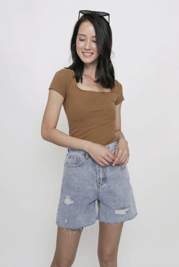 Essence Basic Top (Camel) (Category: Shirts) located in Singapore. Submitted by fl0ral (Listing ID 1179213860, Image 1). Description: From The Tinsel Rack TTR Tagged size S RTP $28.9 Tag removed but only worn to try on PTP 13.5"-15.5" Shoulders 13" Sleeve length 5" Length 20.5" If you liked our Liberty Basic Top, meet her little sister Essence that features a more modest and longer cutting. It's flatters all and looks great tucked in a pair of je