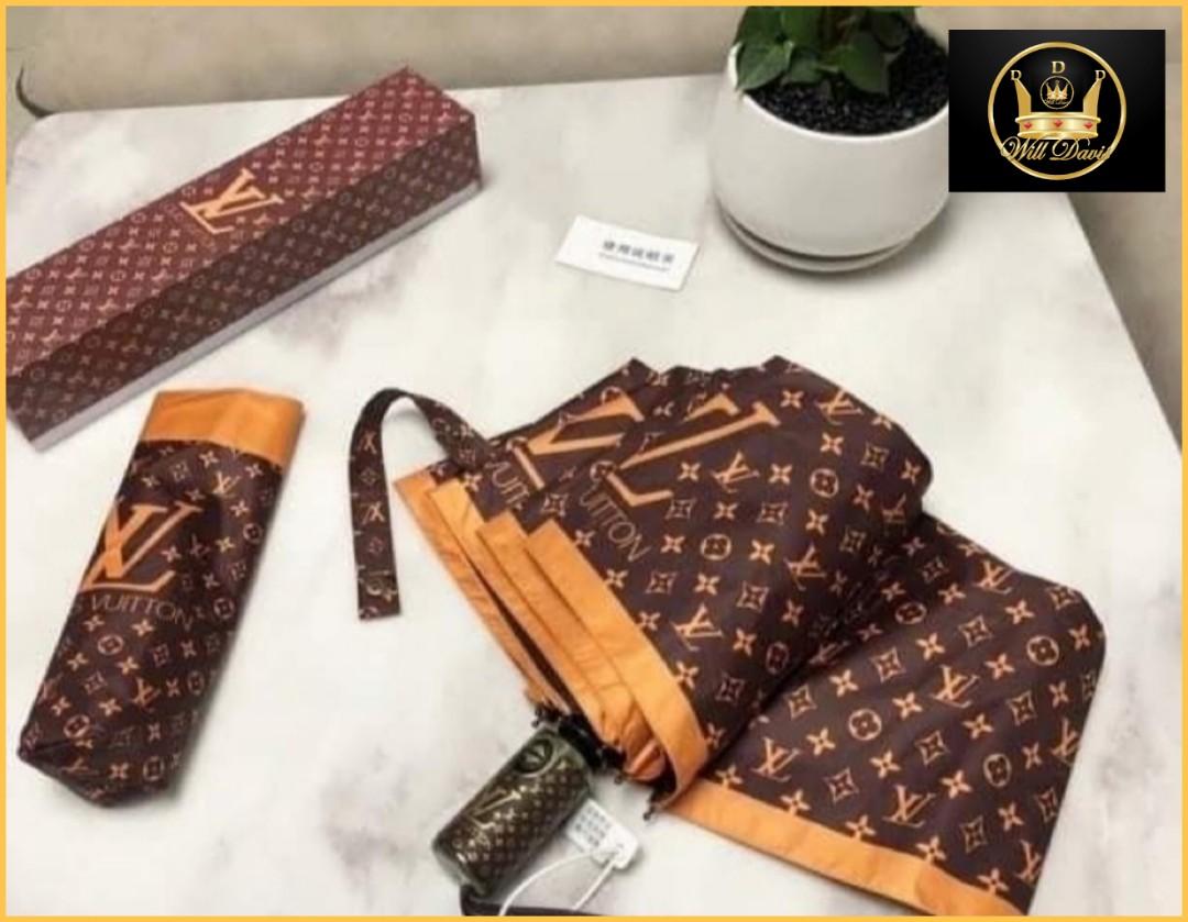 Imported Louis Vuitton White Umbrella ☂️, Hobbies & Toys, Travel, Umbrellas  on Carousell