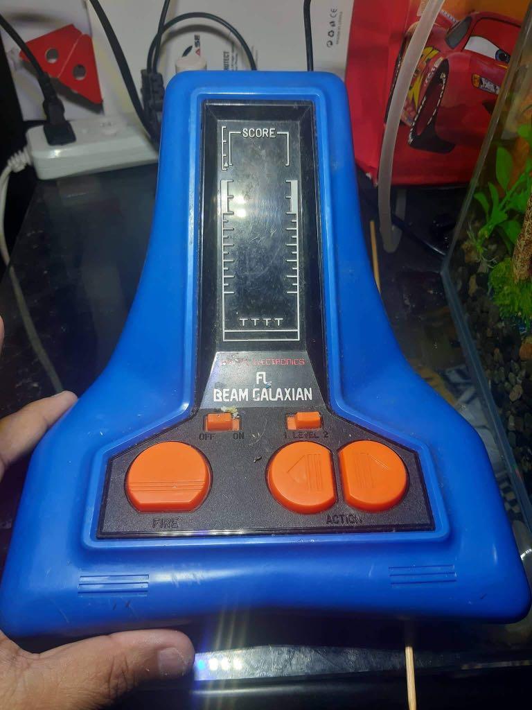 Vintage LF Beam Galaxian toy working (Category: Interactive Toys) located in Manila. Submitted by robert.smith (Listing ID 1179093849, Image 1). Description: Vintage working LF beam galaxian video games ,1500 adaptor not included,2k with adaptor.