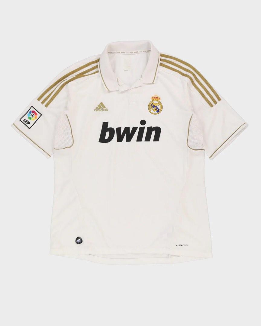 2011-12 Real Madrid White / Gold Home Football Shirt (Category: Tshirts & Polo Shirts) located in Singapore. Submitted by v1ntag33 (Listing ID 1179456814, Image 1). Description: Brand New Size XL.