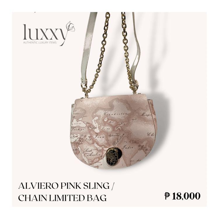 Alviero Pink Limited Bag (Category: Luxury Bags & Wallets) located in San Jose del Monte. Submitted by luxxyluxuryitems (Listing ID 1179395247, Image 3). Description: Let yourself be tempted by the unique style of the Bags by Donna di Alviero Martini Prima Classe and its iconic Geographic Print. ✨ Grab now this beautiful, limited editon Alviero Pink Sling / Chain Bag! ✔️ 💠 Authentic / Original 💠 Rank N (Brand New) 💠 Color: Pink 💠 Complete Inc