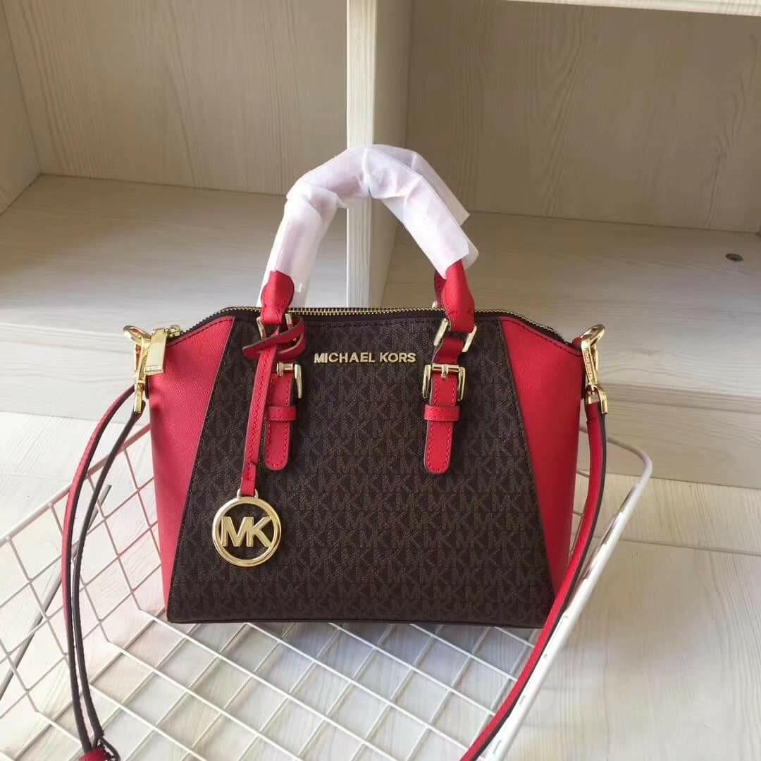 🇺🇲Authentic Michael Kors Medium Ciara Messenger🇺🇲 (Category: Luxury Bags & Wallets) located in Santa Cruz. Submitted by janelovebagswatchesshoesph (Listing ID 1179365716, Image 1). Description: Saffiano leather Top zip closure Double top handles, adjustable removable shoulder cross body strap Interior : 1 slip pocket, 1 zip secure pocket. Signature lining, front logo and gold hardware; Bottom 9.1 Top 11 L x 7.8 H x 3.9 D.