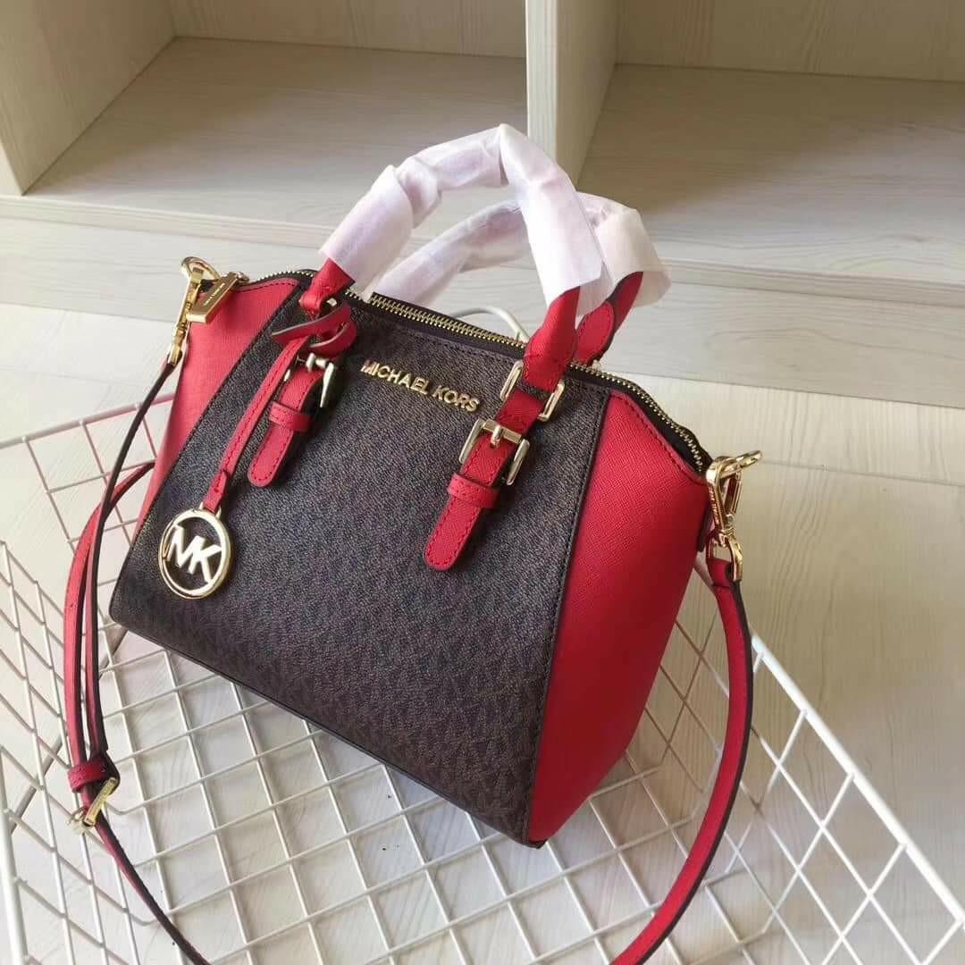 🇺🇲Authentic Michael Kors Medium Ciara Messenger🇺🇲 (Category: Luxury Bags & Wallets) located in Santa Cruz. Submitted by janelovebagswatchesshoesph (Listing ID 1179365716, Image 3). Description: Saffiano leather Top zip closure Double top handles, adjustable removable shoulder cross body strap Interior : 1 slip pocket, 1 zip secure pocket. Signature lining, front logo and gold hardware; Bottom 9.1 Top 11 L x 7.8 H x 3.9 D.