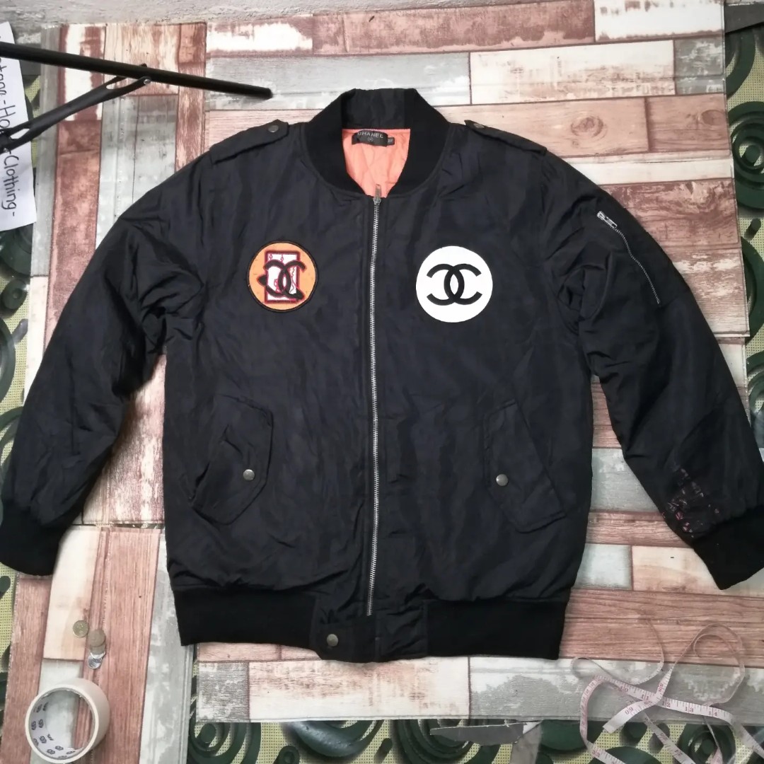 Sold at Auction A Chanel Boutique leather bomber jacket with fabric collar