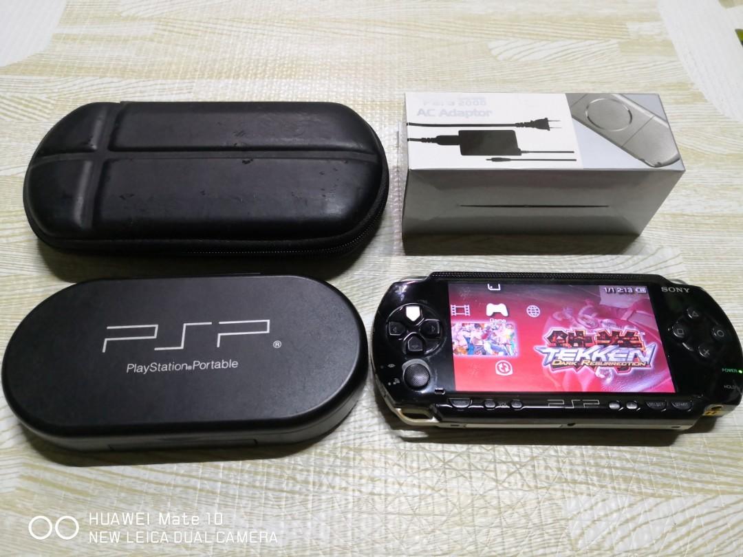 FOR SALE Sony Playstation Portable, Custom Firmware installed already, with 8 Original UMD