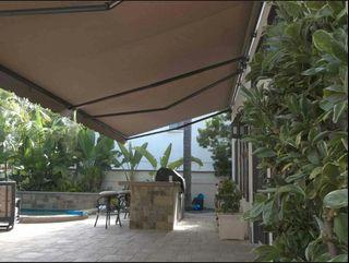 FULLY ASSEMBLED RETRACTABLE AWNING