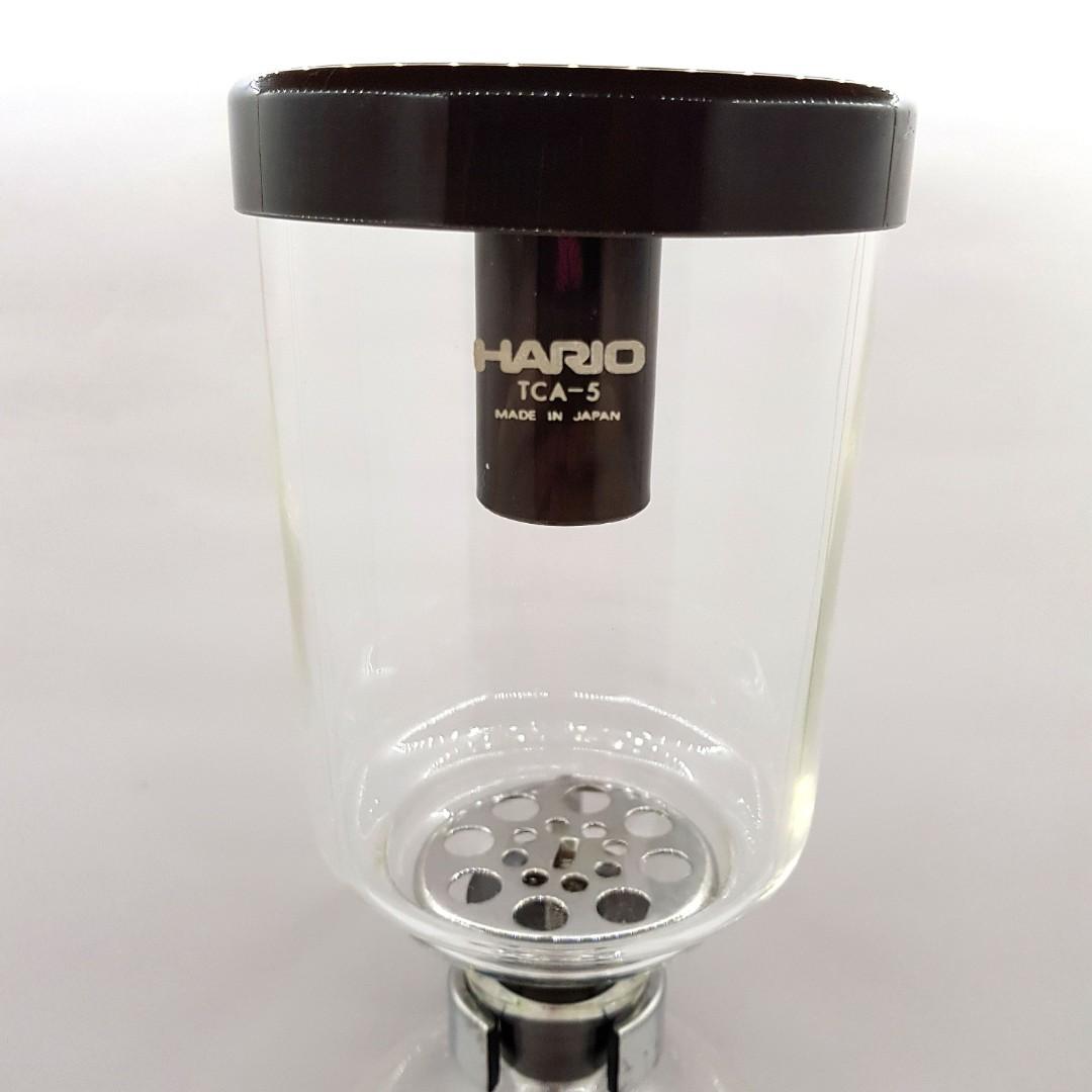 Hario Syphon TCA-5 coffeemaker (Category: Other Kitchenware & Tableware) located in Imus. Submitted by mostlyvintage (Listing ID 1179394245, Image 3). Description: 🎀 Hario Syphon TCA-5 coffeemaker 🎀 🎀 5-cup capacity 🎀 🎀 never been used; no box 🎀 🎀 last pic grabbed from the orange app (not my store) 🎀 clear glass; brownish hue is due to lighting 🎀 🌸 for fashion finds and other stuff, pls. visit my other store: https://carousell.app.link/