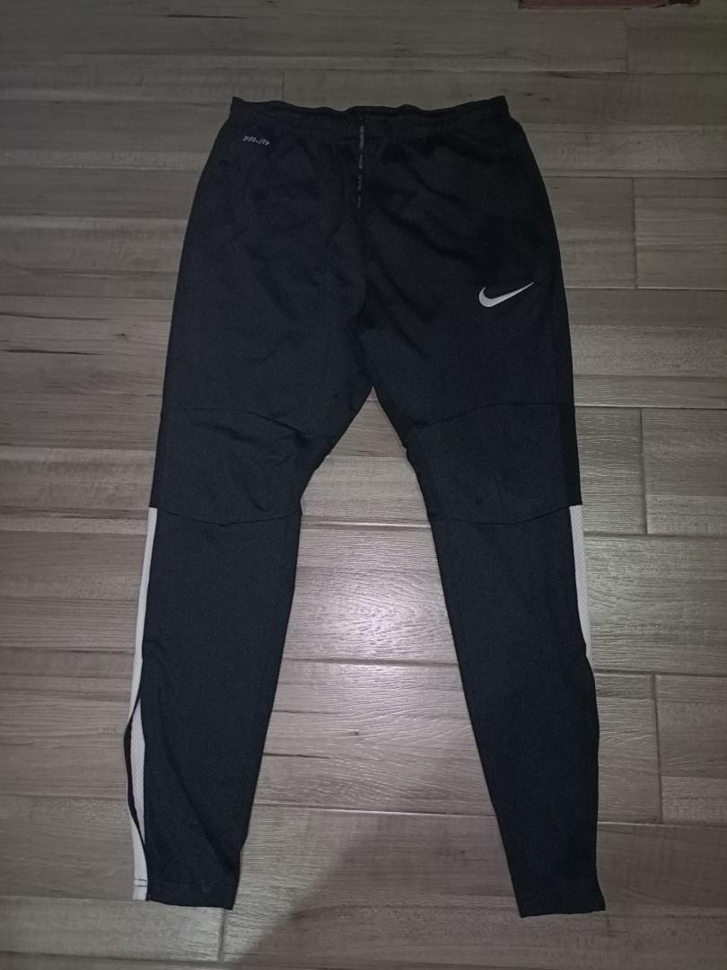 Nike joggers with zippers on sales ankles
