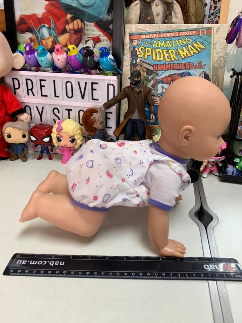 Giggles and top wiggles crawling baby