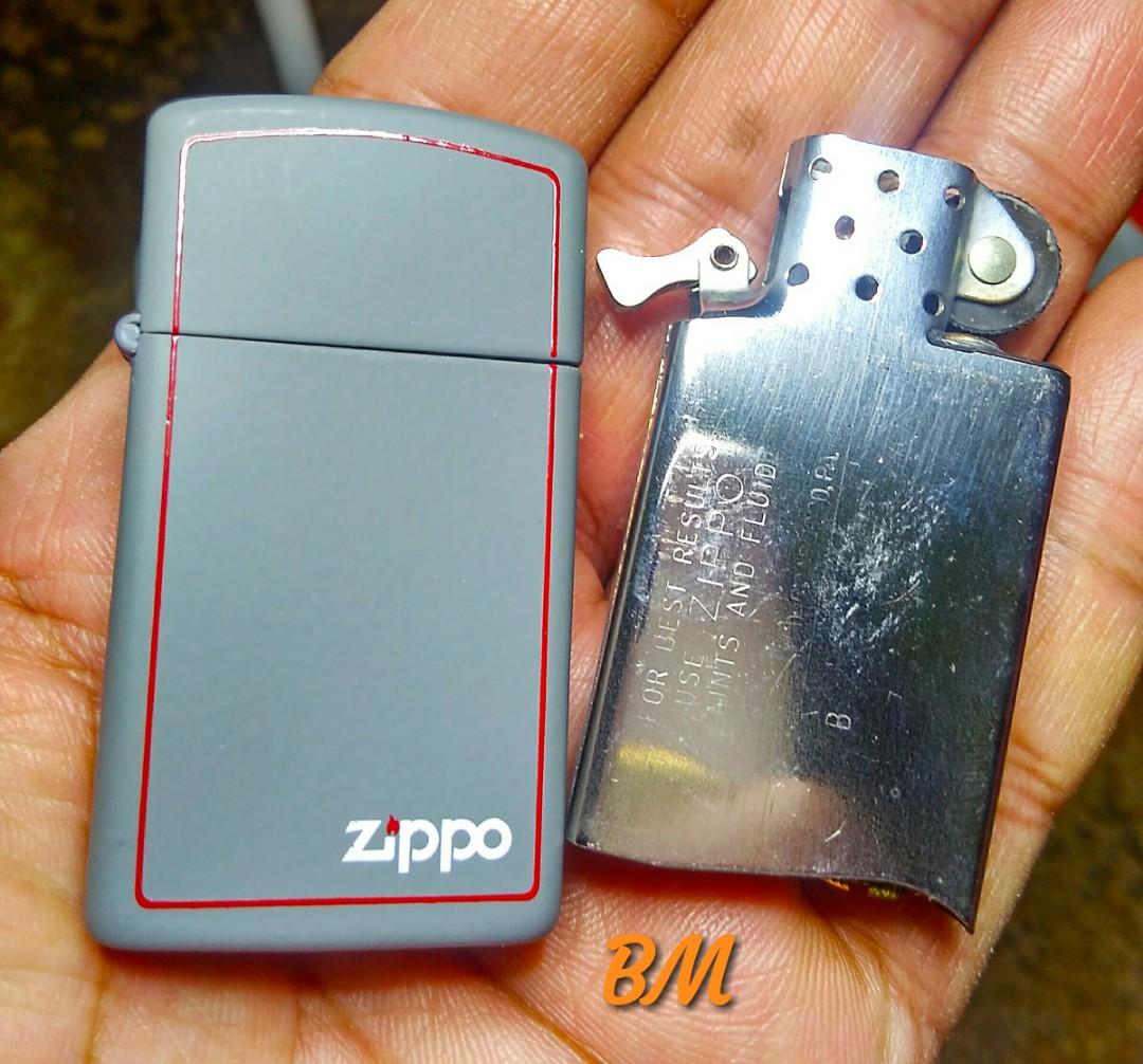 Zippo slim red line, Hobbies & Toys, Collectibles & Memorabilia ...