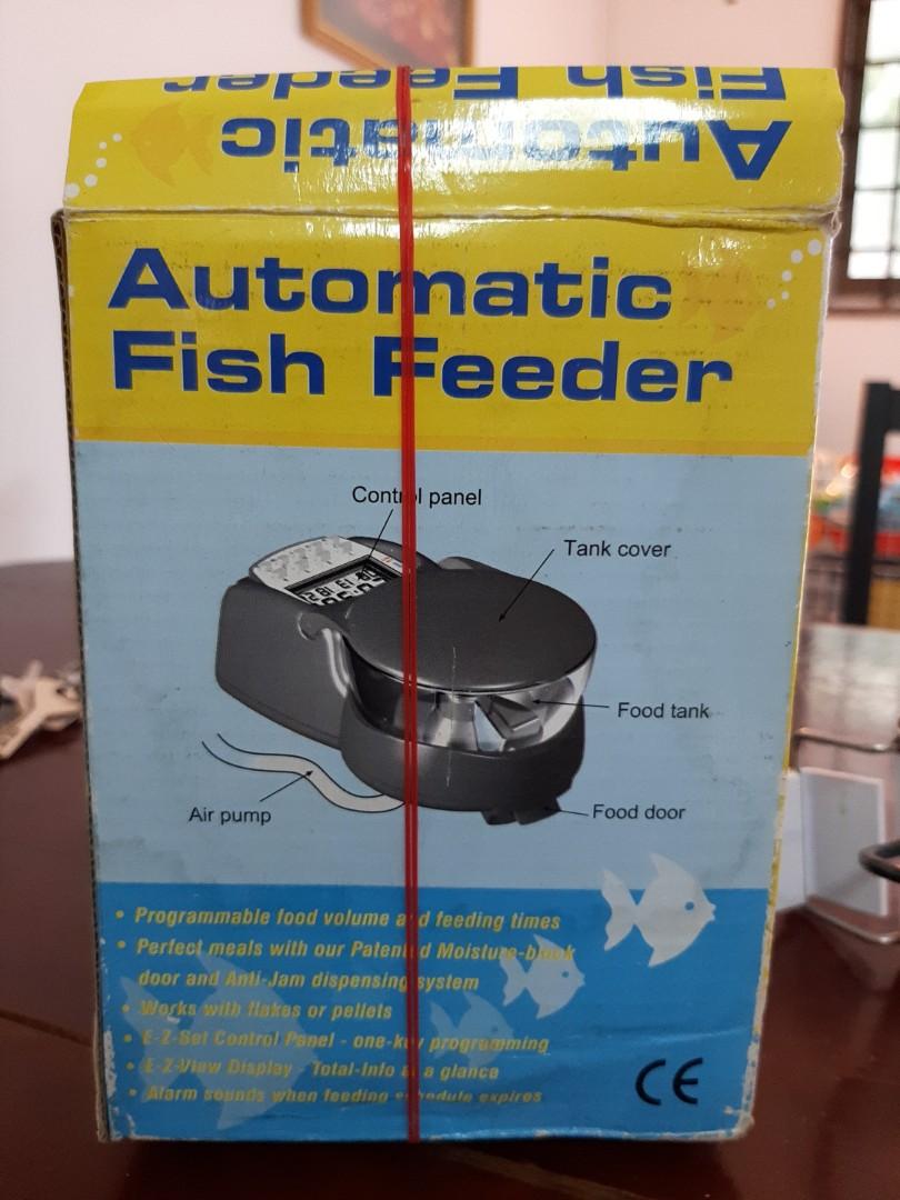 Automatic fish feeder , Guppy foods Tetra , UV Lamp , thermometer for