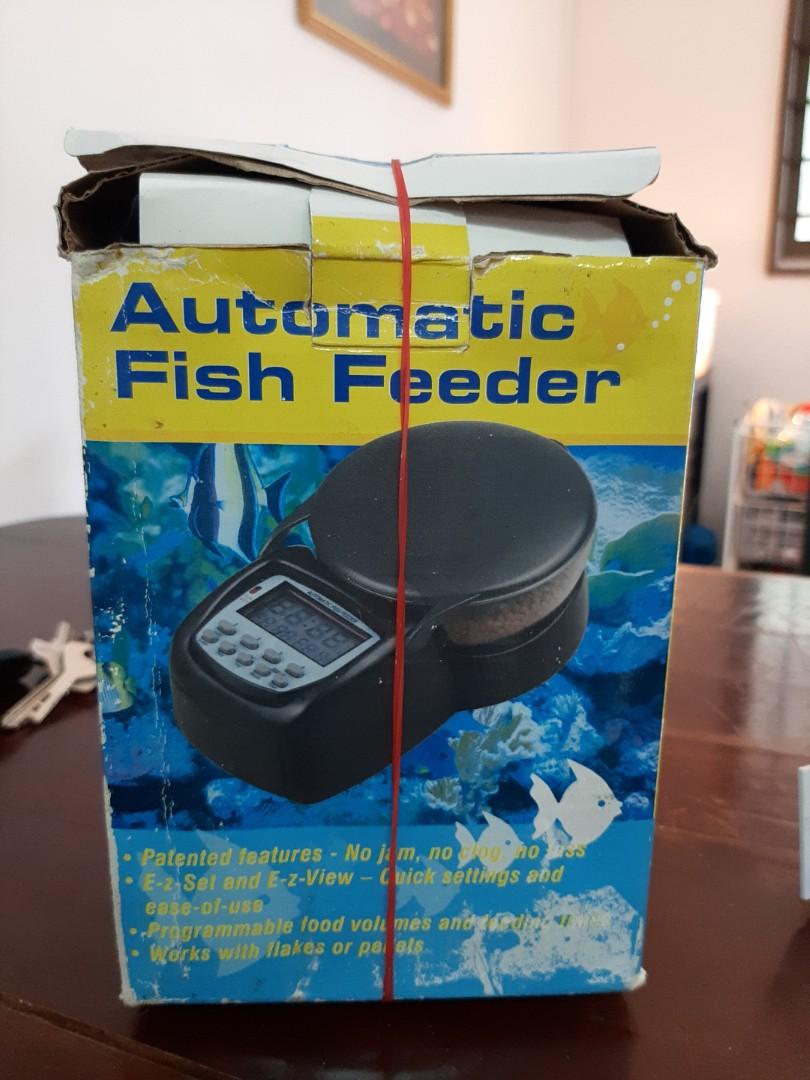 Automatic fish feeder , Guppy foods Tetra , UV Lamp , thermometer for