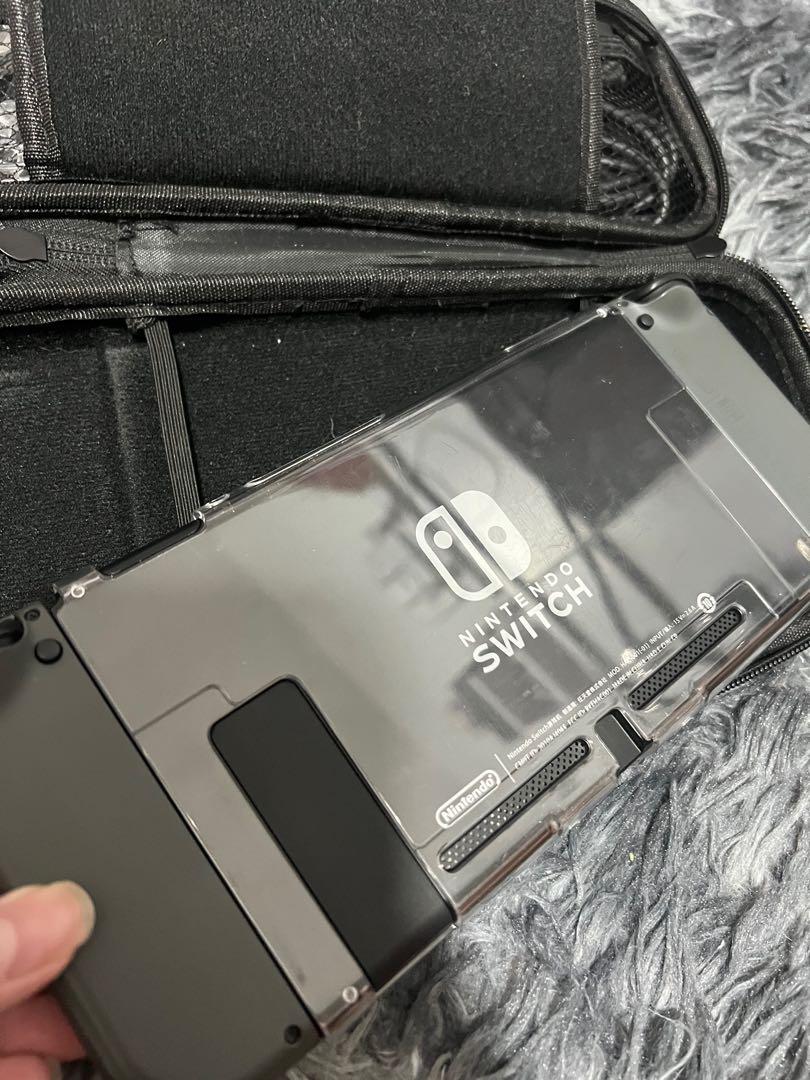 Nintendo Switch V2 with Accessories & Games included (Category: Nintendo) located in Bulacan. Submitted by itslouisem (Listing ID 1179531253, Image 3). Description: Complete accessories 1 yr old only Like new with box & manual No scratches, installed screen protector since day 1 No issue 100%.