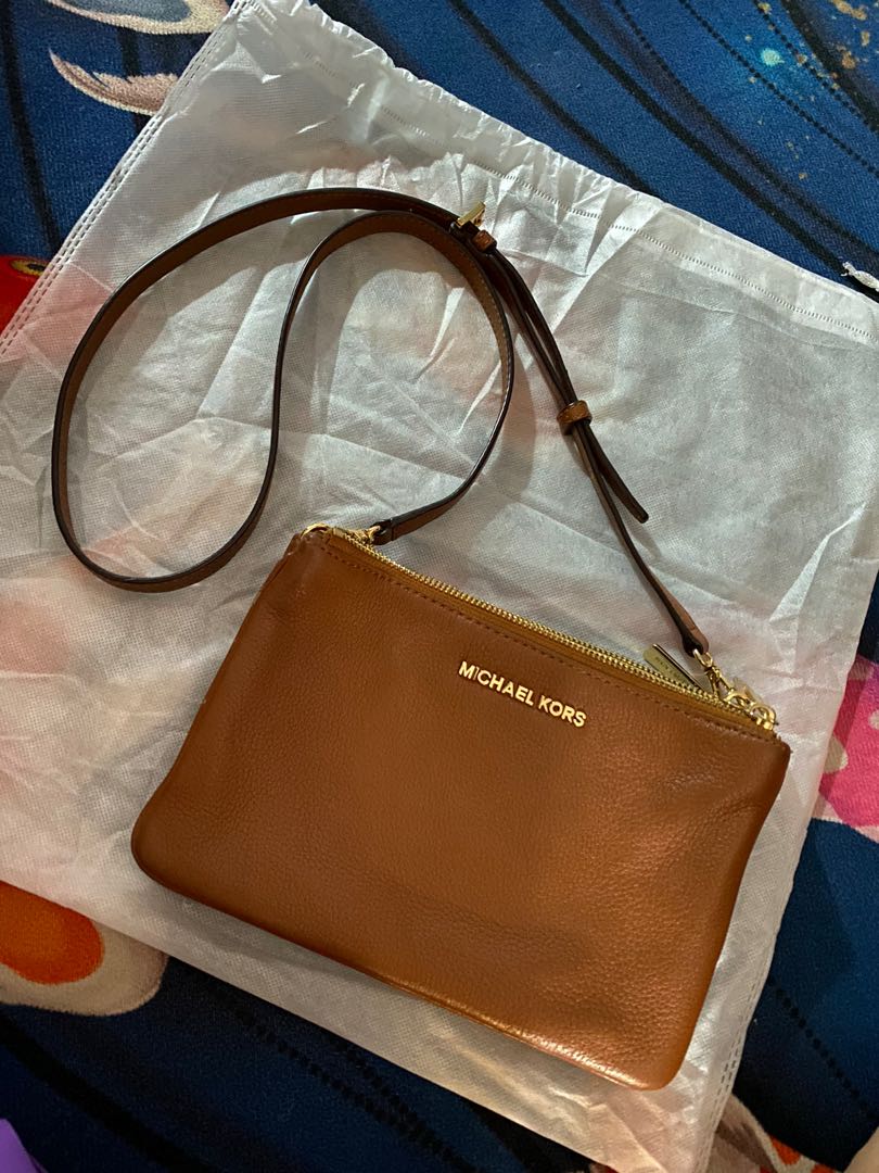 Authentic mk outlet sling bag