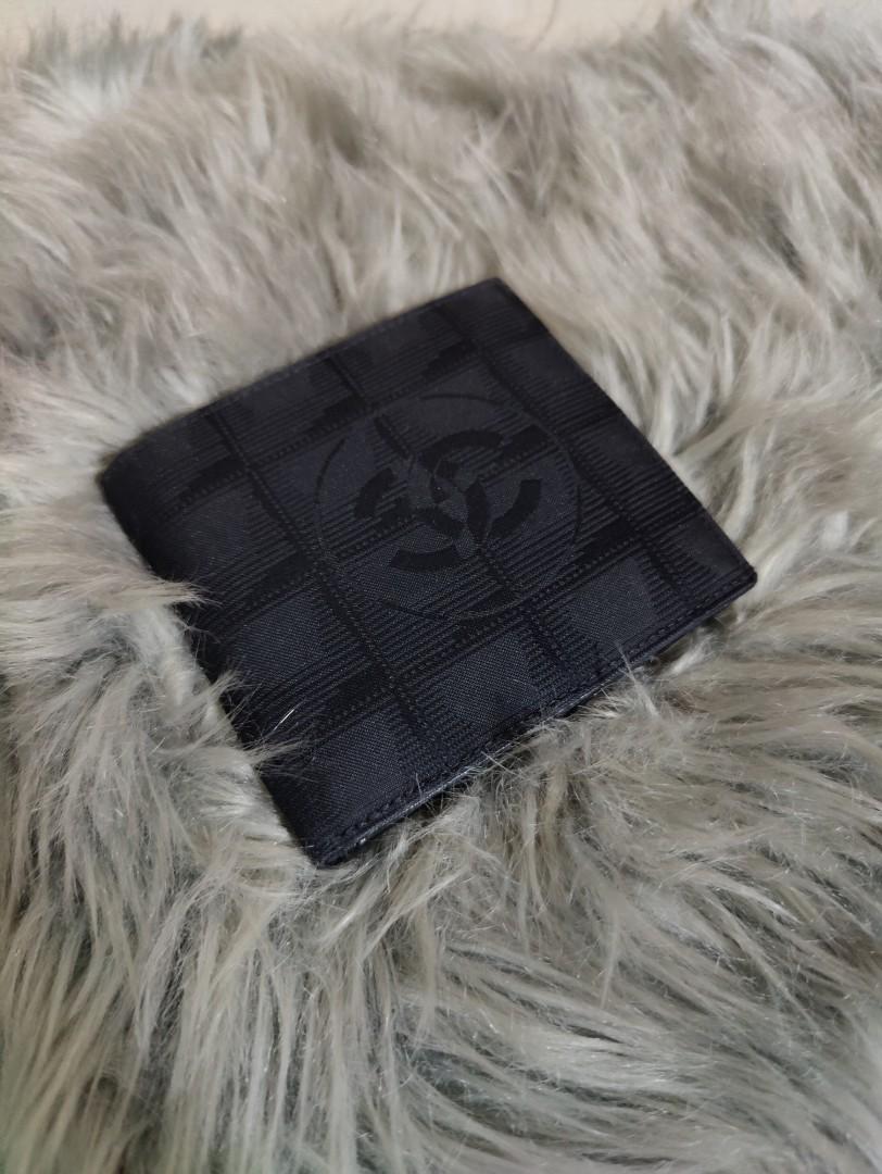 Chanel Mens Wallet (Category: Luxury Bags & Wallets) located in Marikina City. Submitted by noblecat_40a38b (Listing ID 1176200873, Image 1). Description: Chanel Travel Line Bifold Wallet Nylon Exterior, Leather Interior With Coin Purse Card Holder slots Main Bills compartment In good condition 8/10 No Issue, normal sign of use only Wallet only and Firm Price Plus SF.