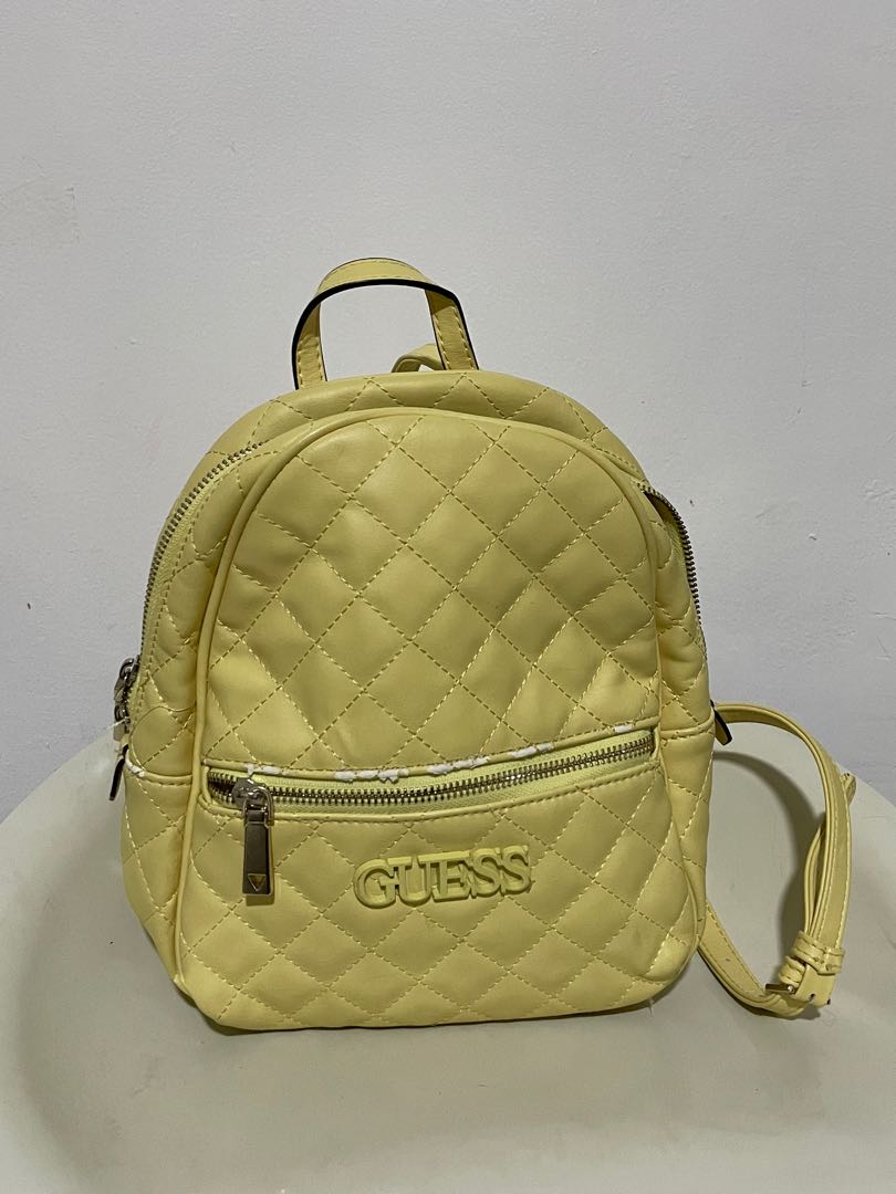 Yellow guess backpack top