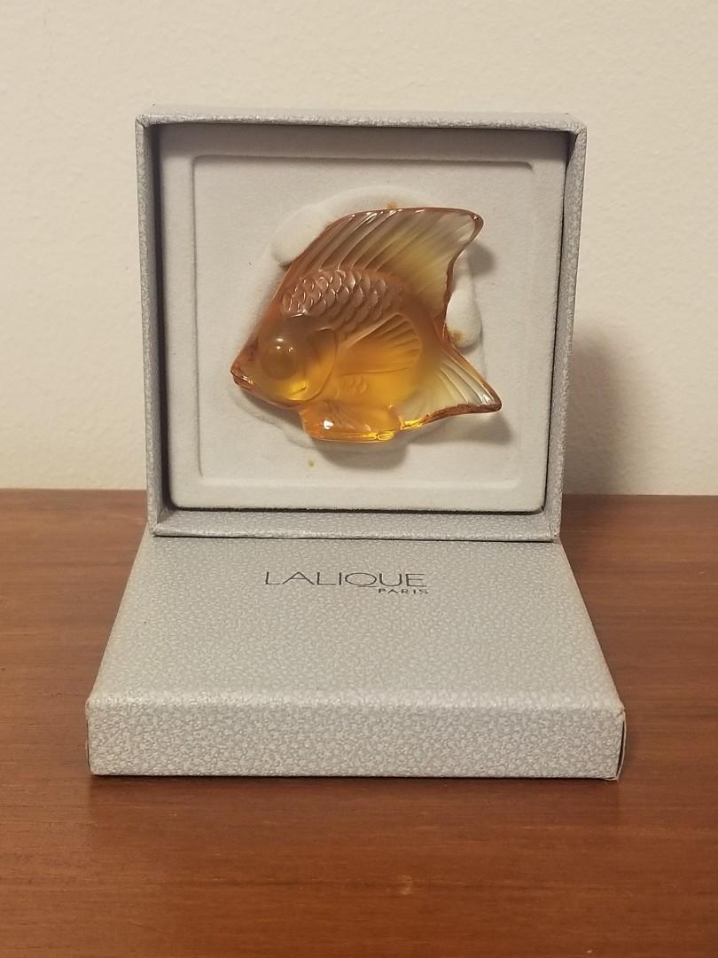 Lalique crystal fish sculpture (amber) (Category: Other Home Decor) located in Cebu City. Submitted by tuourb (Listing ID 1176149504, Image 2). Description: Lalique amber crystal fish sculpture -no flaws, kept in storage -box has some stains.