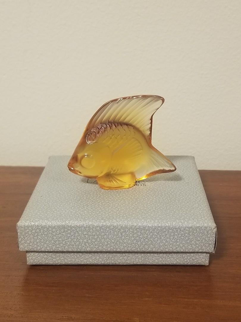 Lalique crystal fish sculpture (amber) (Category: Other Home Decor) located in Cebu City. Submitted by tuourb (Listing ID 1176149504, Image 3). Description: Lalique amber crystal fish sculpture -no flaws, kept in storage -box has some stains.