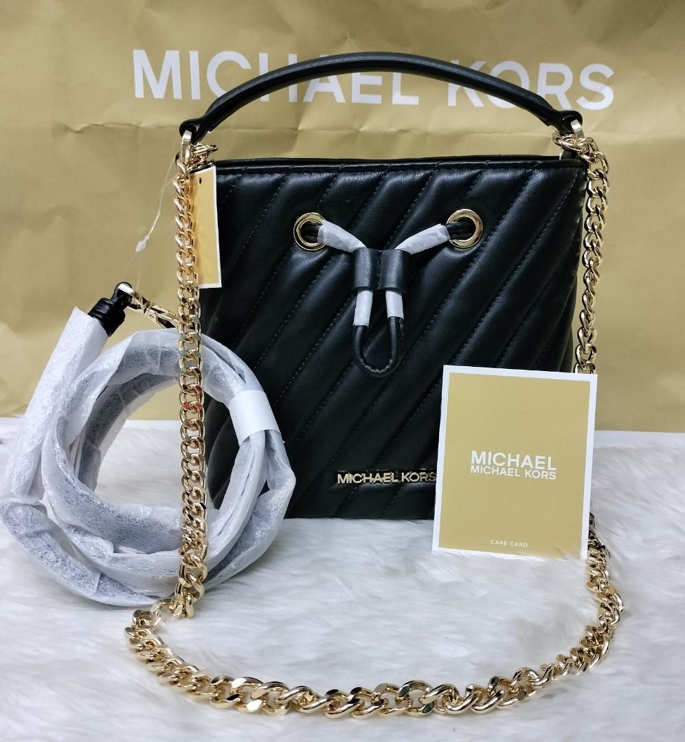 Michael kors medium suri bucket bag, Women's Fashion, Bags & Wallets,  Cross-body Bags on Carousell