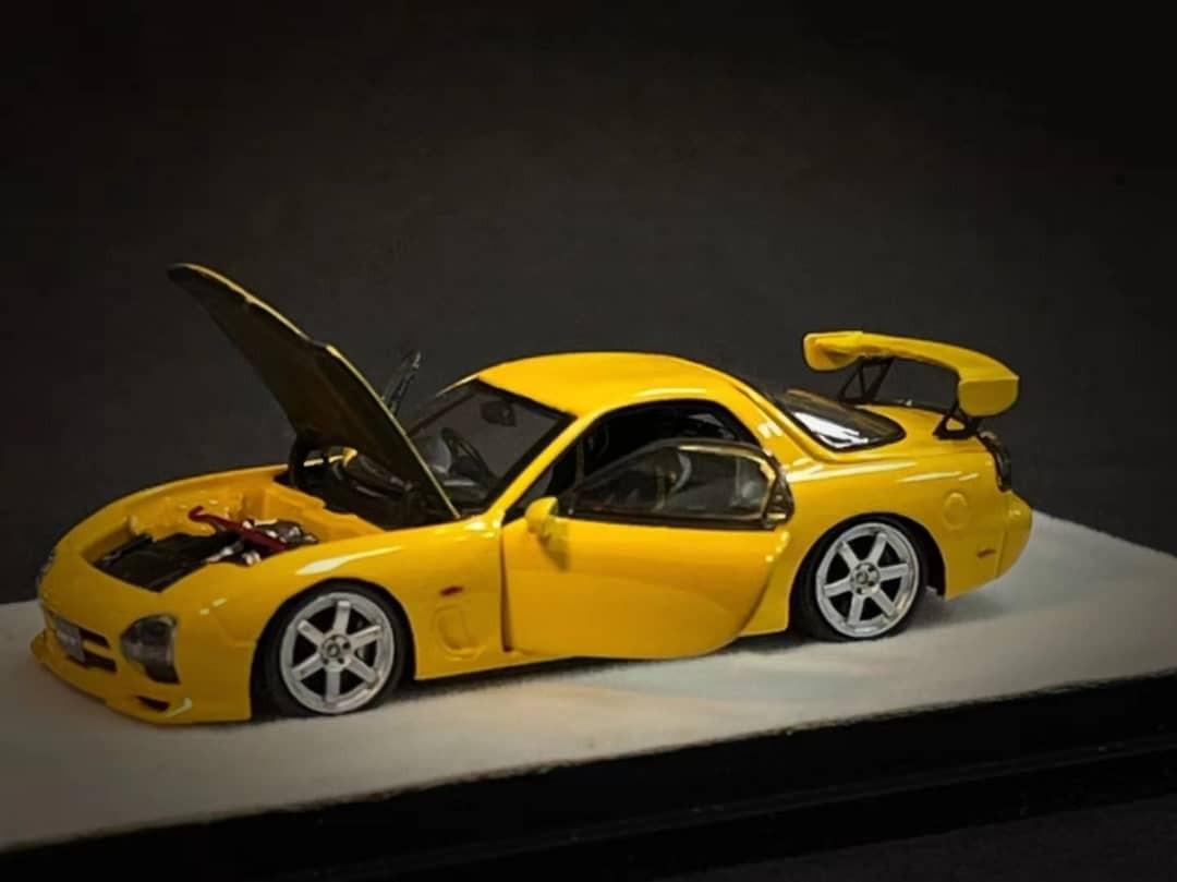 PGM 1:64合金全開模型，新車型！RX-7 FD3S Spec A，首批預售中。Yellow