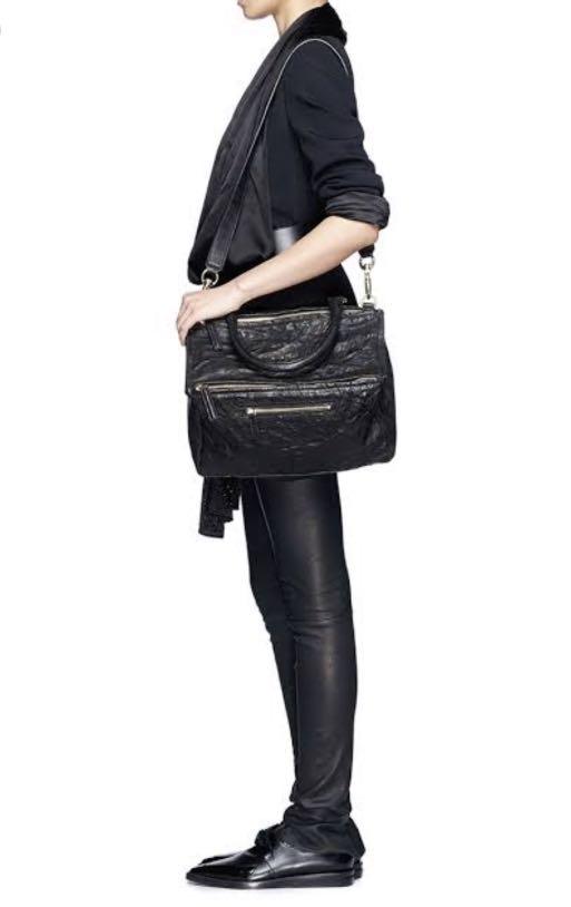 Authentic Givenchy Pandora in Black Pepe Lambskin Leather (Category: Luxury Bags & Wallets) located in Las Pinas. Submitted by mcamillesl (Listing ID 1179704578, Image 2). Description: Authentic Givenchy Pandora in Black Pepe Lambskin Leather Medium Size Used condition Inclusions: No more cards, only dustbag Bought before around 92,000 pesos Shipping c/o buyer.