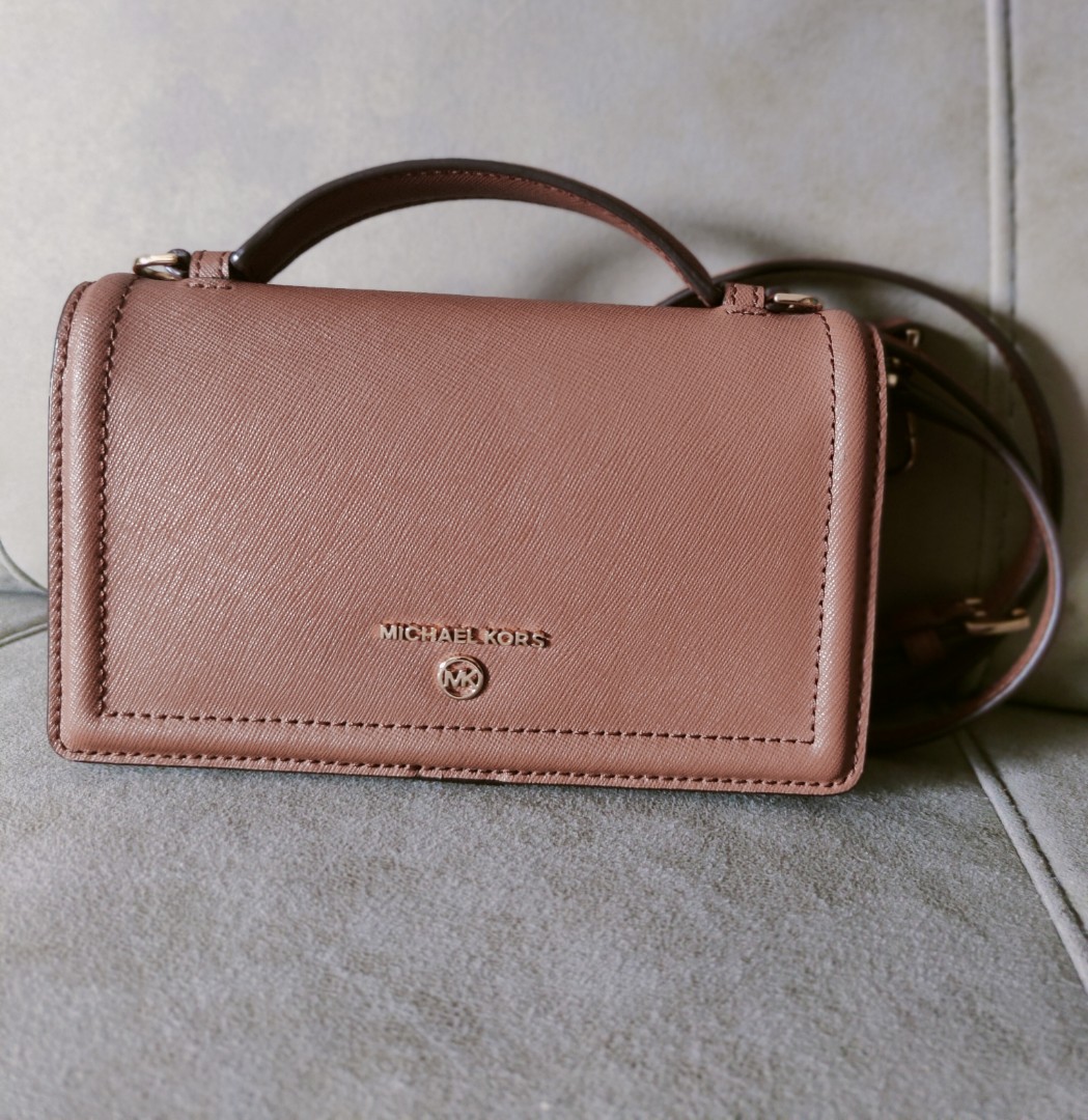 Michael Kors Mini Pochette Crossbody Bag, Luxury, Bags & Wallets on  Carousell