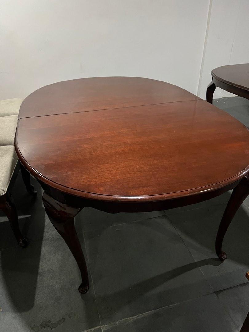 Solid wood dining table round (Category: Tables & Sets) located in Manila. Submitted by thriftythings.mnl (Listing ID 1179796275, Image 1). Description: Dining table Solid wood - not sure what wood used Round With minor scratches Very sturdy As is where is Table only. No chairs .