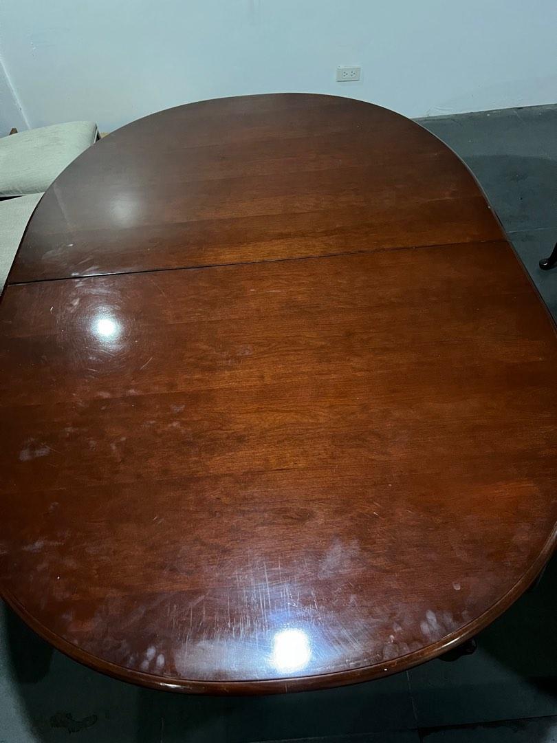 Solid wood dining table round (Category: Tables & Sets) located in Manila. Submitted by thriftythings.mnl (Listing ID 1179796275, Image 2). Description: Dining table Solid wood - not sure what wood used Round With minor scratches Very sturdy As is where is Table only. No chairs .