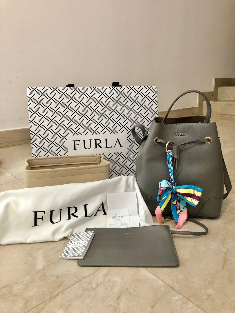 Priced to sell 100 genuine Furla Stacy leather bucket bag in grey