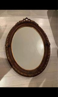 Antique oval shaped frame mirror