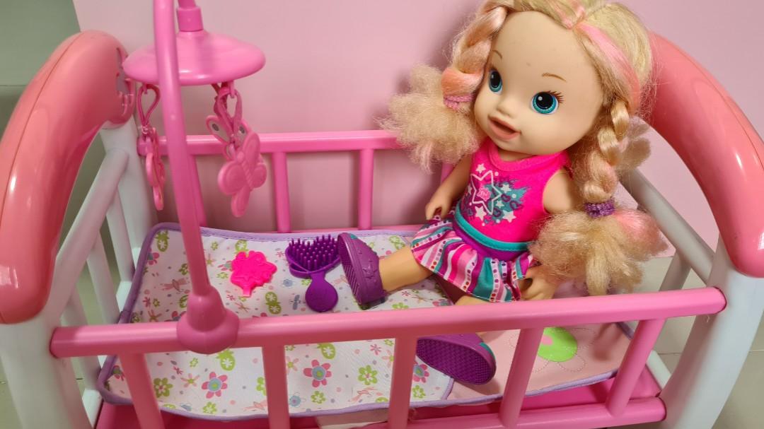 Fisher Price Toy Cot and Baby Alive, Hobbies & Toys, Toys & Games on Carousell