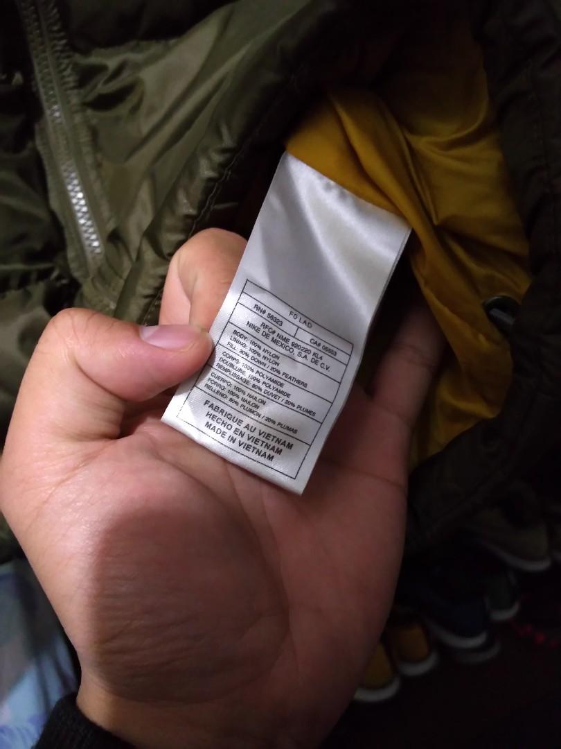 Plumas shop nike olive