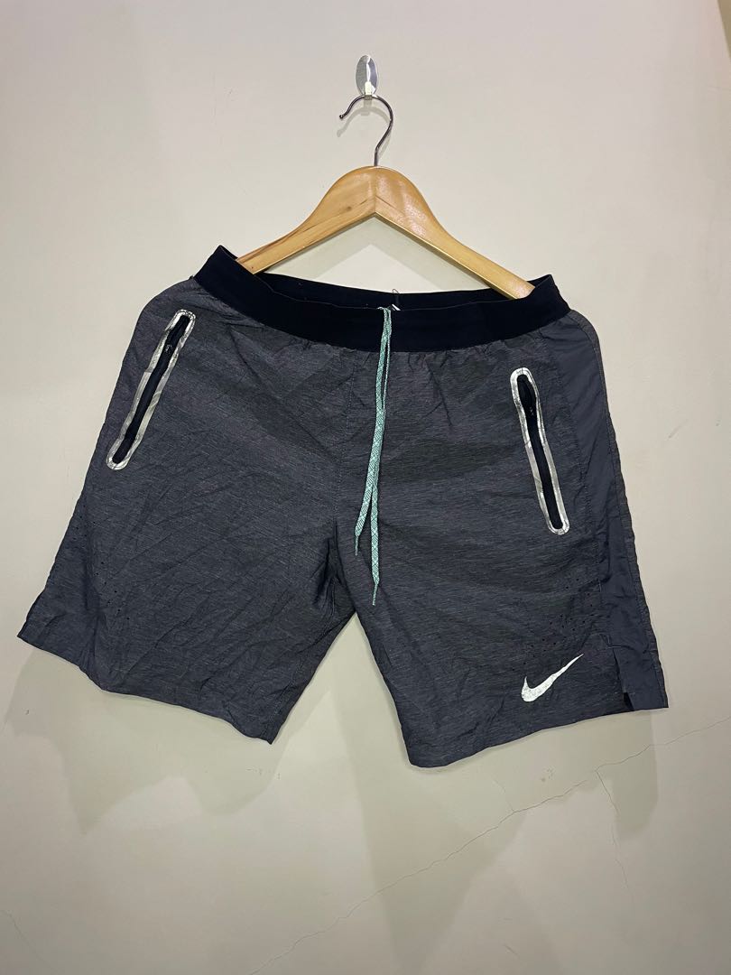 NIKE ABOVE THE KNEE SHORT, Men's Fashion, Bottoms, Shorts on Carousell