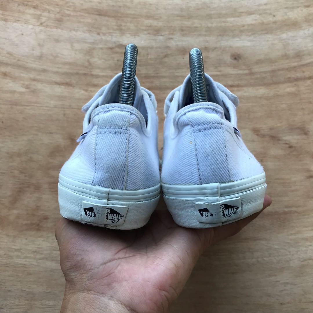 All white store velcro vans